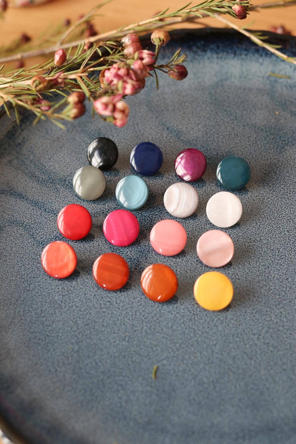 Mother-of-pearl buttons with tails by Lise Tailor