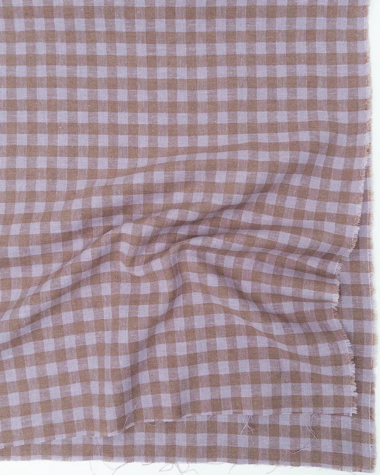 Brown and white checkered fabric
